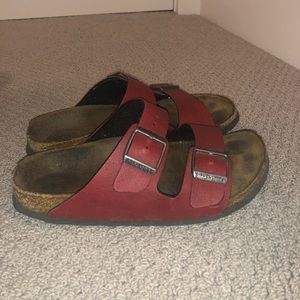 Red leather two buckle Birkenstock’s